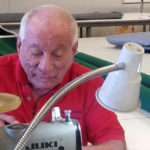 photo of ron repairing machine